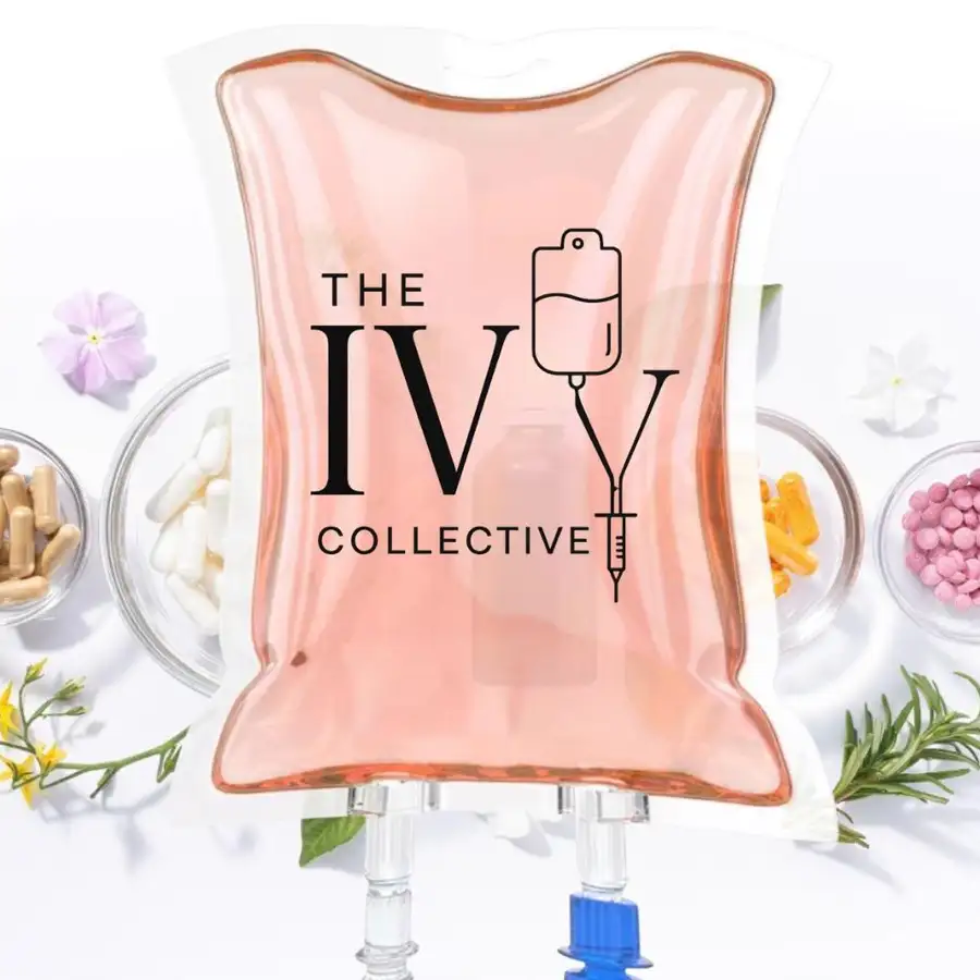 The Ivy Collective's branded IV drip bag displayed alongside bowls of colorful vitamins and supplements, showcasing the wellness treatments available in Sherman, IL.